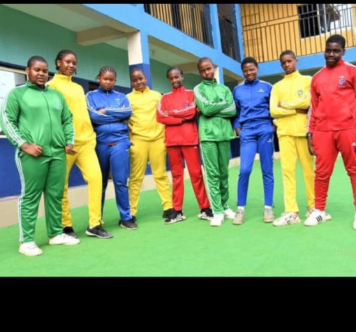 Group of students wearing branded sportswear tracksuits