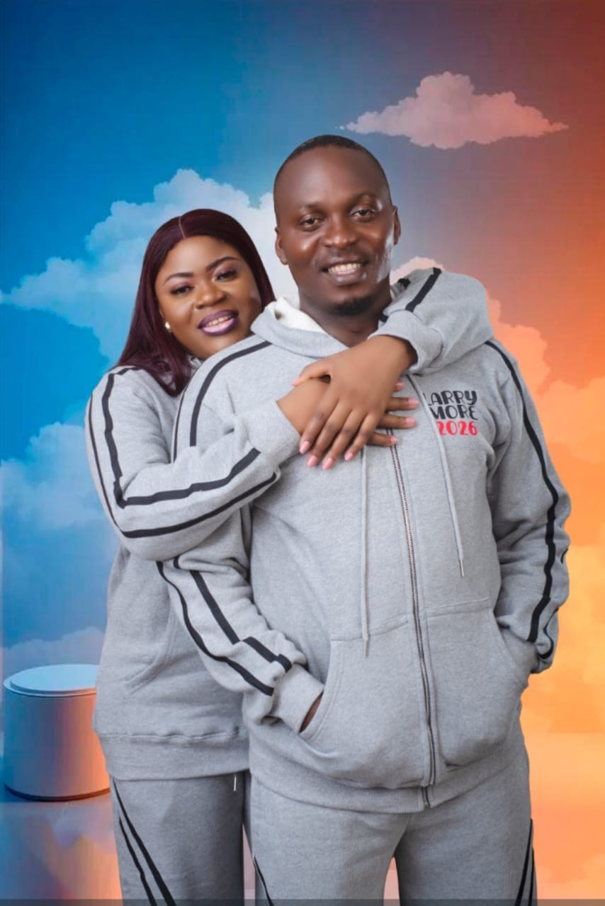 Couple styled in matching grey fleece tracksuits